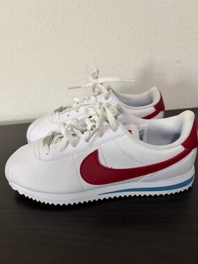 Nike Kids Size 2 White Sneakers with Red Swoosh and Blue Stripe